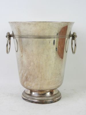 silver plated ice bucket with handles and handles on a stand