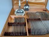 silverware in a wooden box with spoons and spoons in it
