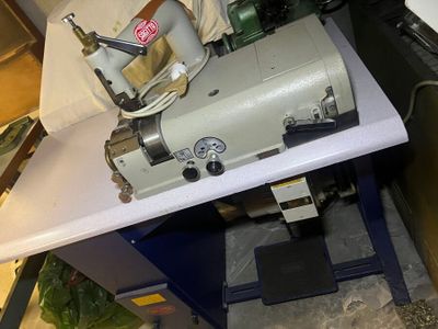 a sewing machine sitting on a table in a room