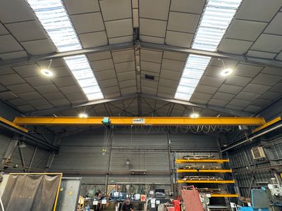 a large warehouse with a lot of equipment in it
