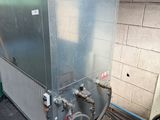 a large air conditioner that is in a garage