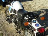a motorcycle that is parked on the side of the road