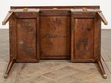 an old wooden cabinet with two doors on it