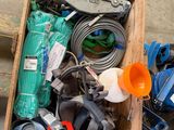 a box full of assorted items on the floor