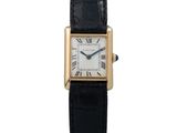 Montre Cartier Tank pour femme en or jaune 18 carats