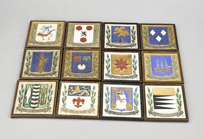 nine tiles with different designs on them on a table