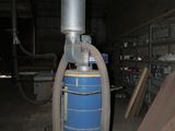 a blue machine that is sitting in a room