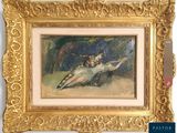 tableau représentant une femme à cheval, dans un cadre doré accroché au mur