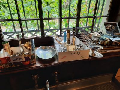 a table with a lot of food on it near a window