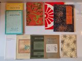 many books on display in a glass case