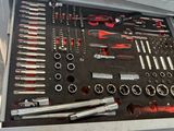 a tool kit in a tool box on a table