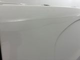 a close up of a white car with a denting on it