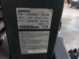 a close up of a parking meter on a city street