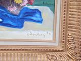 a painting of flowers in a vase on a table