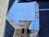 a box that is sitting on a pallet in the parking lot