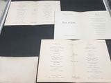 a lot of papers that are sitting on a table