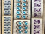 a collection of stamps from different countries on a table
