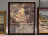 trois tableaux accrochés au mur au-dessus d'un canapé