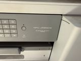 a close up of a printer with a keypad on it
