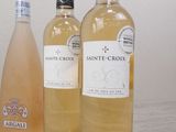 three bottles of wine sitting next to each other on a table
