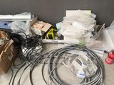 a pile of wires and other items on the floor