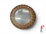 a mirror that is sitting on the wall