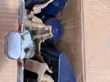 a cardboard box with a bunch of items inside of it