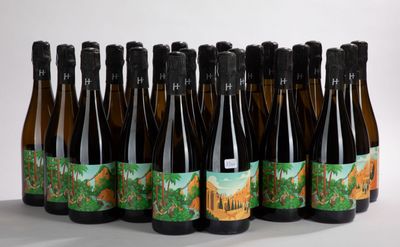 six bottles of beer are lined up in a row on a white surface