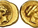 une pièce d'or portant l'image d'une femme et d'un homme