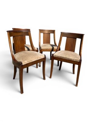 three wooden chairs with upholstered seats and a beige upholstered seat