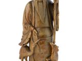 statue of a man with a goat and a bird on a white background