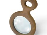 the magnifying glass is shaped like a wooden object with a wooden handle