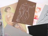 many different types of art work on a table
