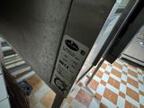 a sign on the door of a kitchen that says don ' t enter