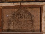 an image of a close up of a piece of wood with writing on it