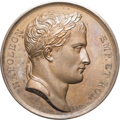 une image montrant un gros plan d'une pièce de monnaie à l'effigie d'un homme