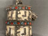 an image of a small bell on a stick