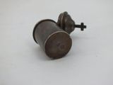 a small metal object that is on a table