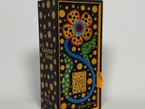 a small box with a design on it