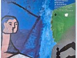 la couverture d'un magazine sur laquelle figure le portrait d'une femme en robe bleue