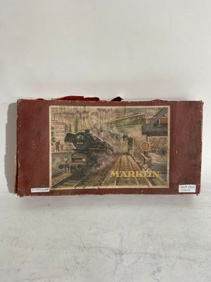 une valise sur laquelle est représenté un train