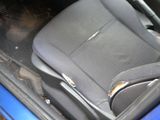 the interior of a car with the seat up and the front seat down