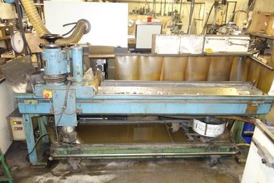 a machine that is working on a piece of metal