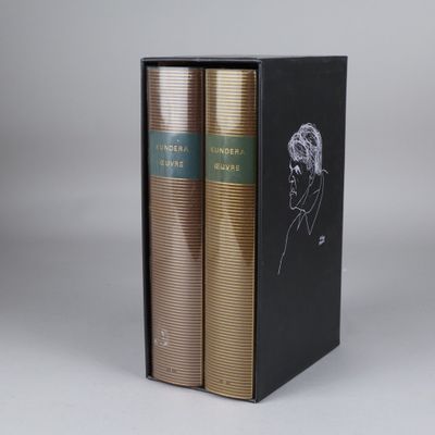 two books in a black box with a drawing of a man ' s face