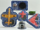 four different toy airplanes in the packaging on the table