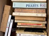 a box full of books sitting on top of each other