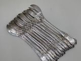 a lot of spoons that are sitting on a table