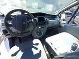 a car with a steering wheel and a dashboard