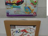 a box with a toy train set in it and a box with a toy train set in it