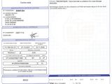 a close up of a document with a picture of an airplane